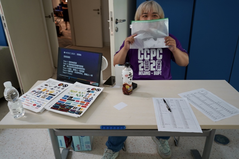 Camber Huang at the reception desk